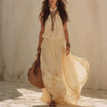 Halter neck and waist cinching dress